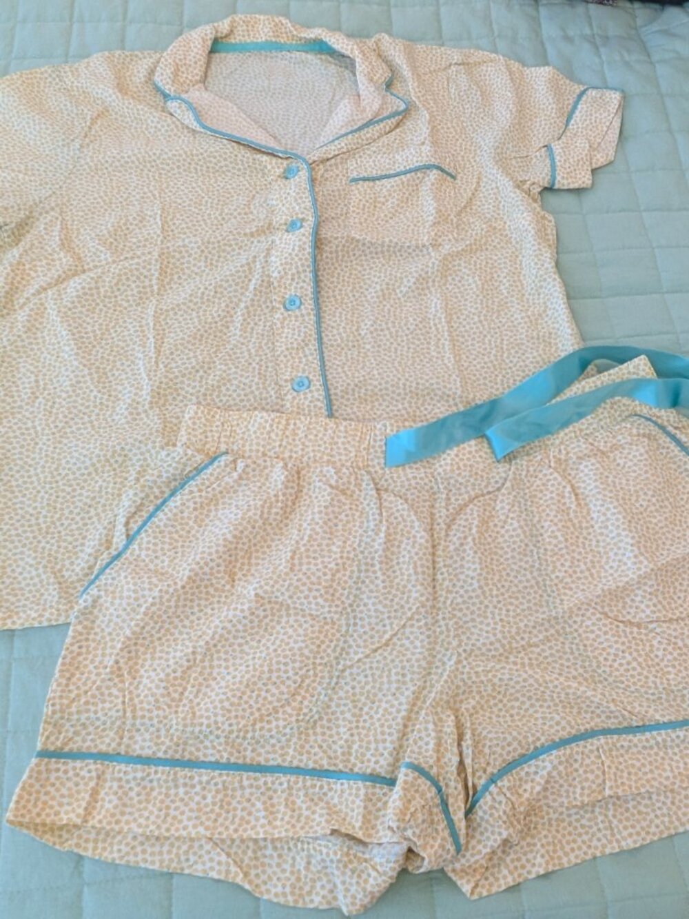Like new Jockey pajama set - Top: Size S; Shorts: Size M. Lemon/Orange pattern